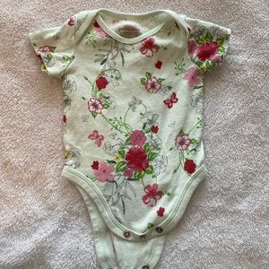 First impressions onesie